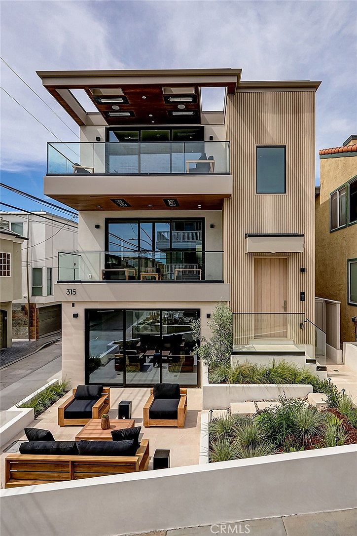 Day-time exterior with full architectural facade visible from the walk-street